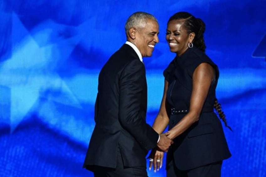 Michelle Obama took to the stage first at the Democratic National Convention, followed by