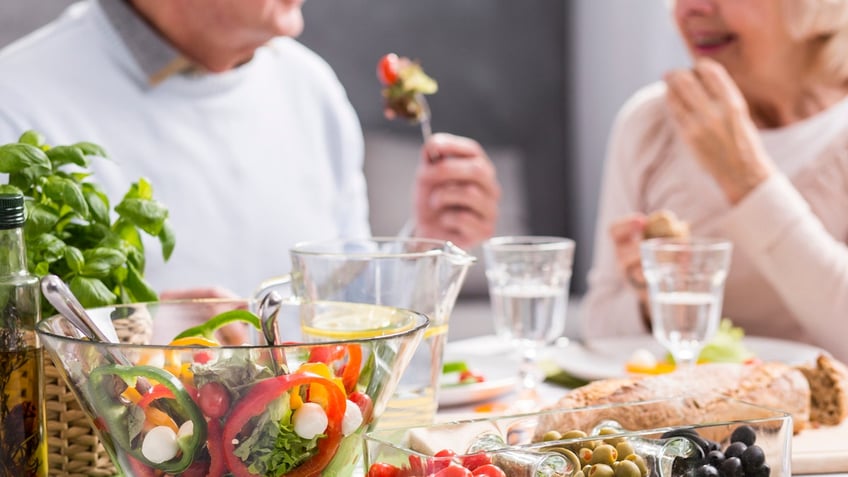 Older couple eating