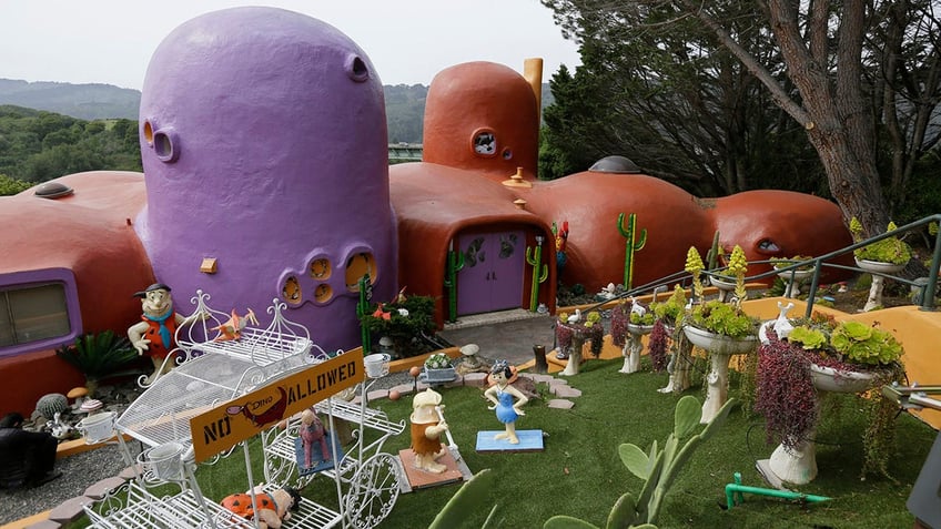 oddest homes in america include the smurf house and one thats legally haunted