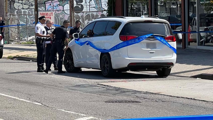 off duty cop shot in street fight with road rage suspect caught on frantic video