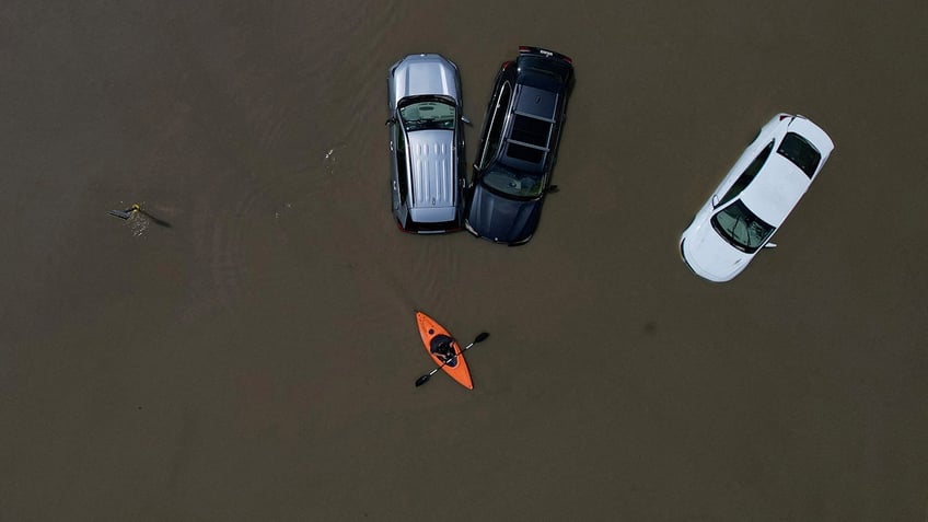 officials warn of contaminated water as mass flooding continues in northeast