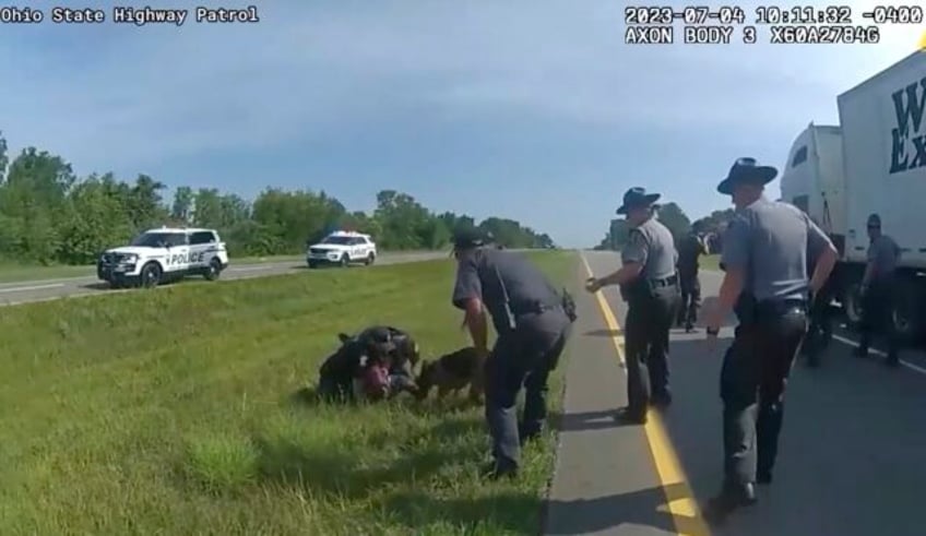 ohio investigates why a police dog was deployed on a surrendering truck driver