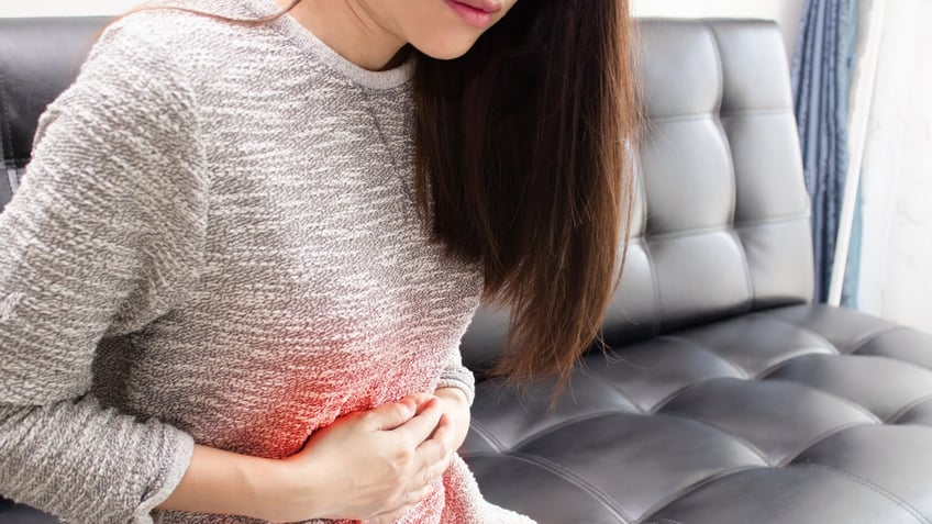 Woman stomach pain