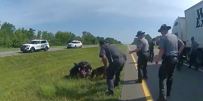 ohio prosecutor asks judge to drop charges against black truck driver mauled by police dog