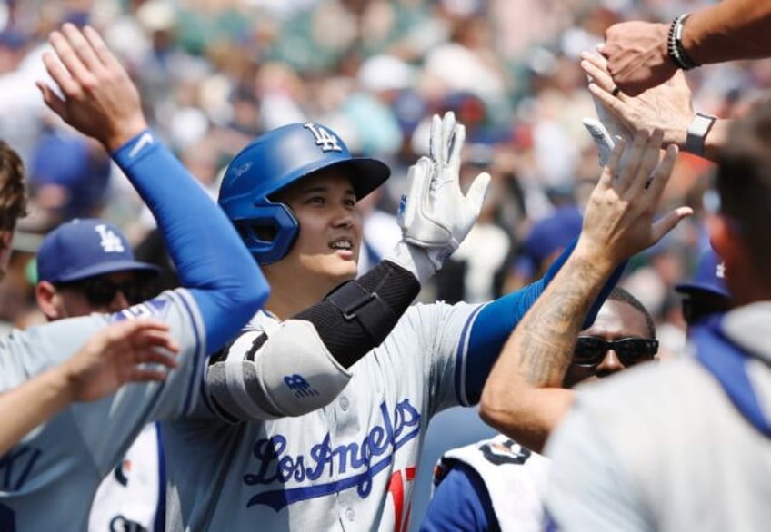 Los Angeles Dodgers' star Shohei Ohtani celebrates his 200th Major League Baseball home ru