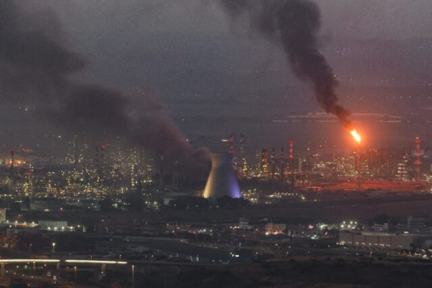 Israel and Iran launched multiple rockets at each other for a fourth day, putting more upw