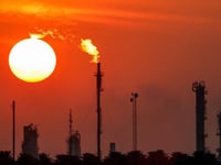 Oil prices slide after OPEC+ output hike