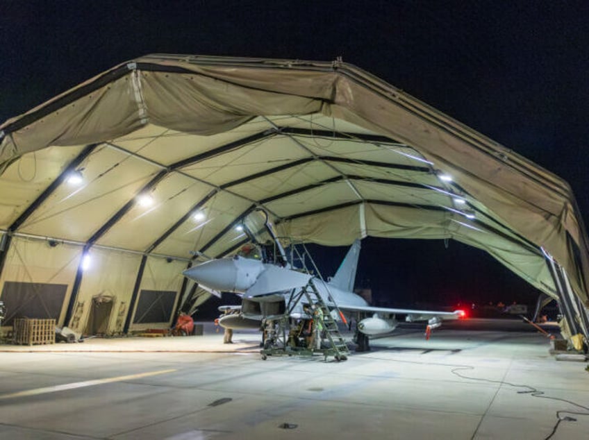 AKROTIRI, CYPRUS - JANUARY 12: In this handout image provided by the UK Ministry of Defence, an RAF Typhoon aircraft returns to berth following a strike mission on Yemen's Houthi rebels at RAF Akrotiri on January 12, 2024 in Akrotiri, Cyprus. On Thursday evening, four RAF Typhoons launched from RAF …