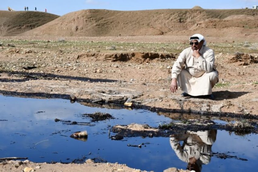 Oil spills in Iraq's north pollute otherwise fertile farmland, rendering vast fields barre