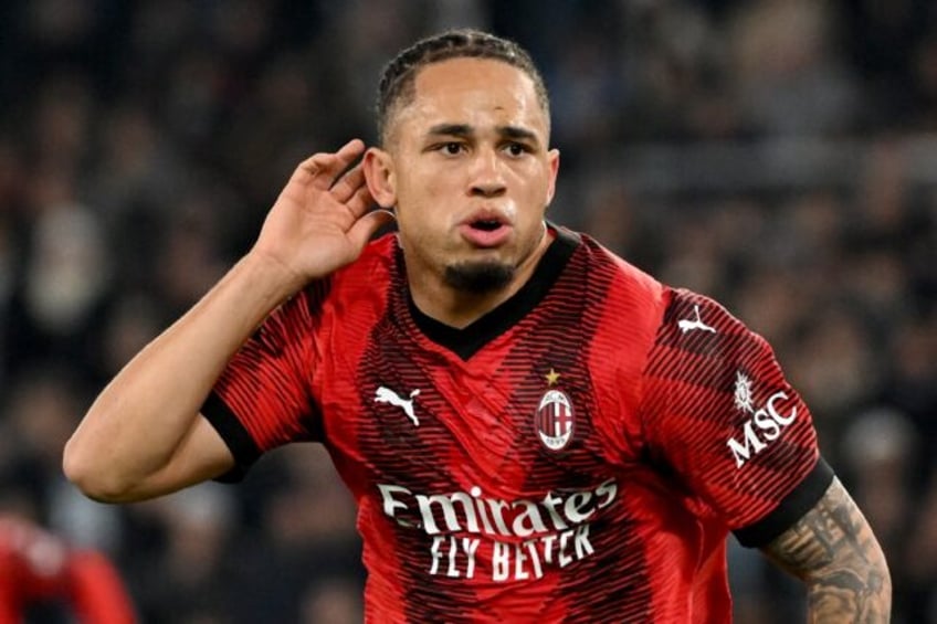 Noah Okafor celebrates his fifth Serie A goal of the season for AC Milan