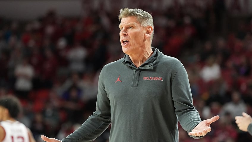 Porter Moser reacts during a game