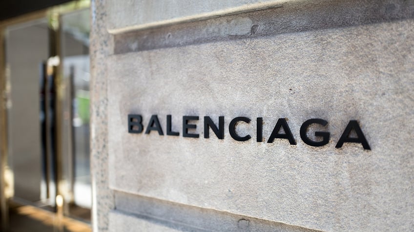 Balenciaga in black lettering on stone