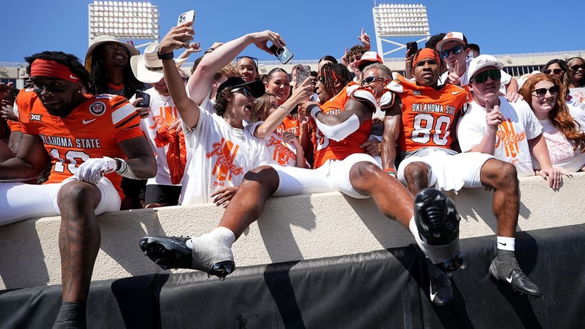 Oklahoma State players in crows