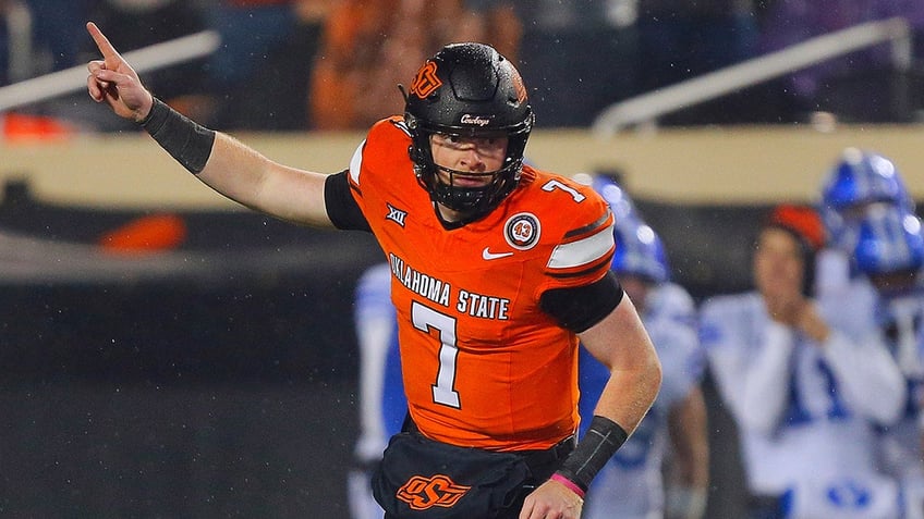 Alan Bowman celebrates a completed pass