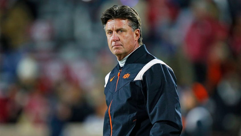 Mike Gundy coaches against Oklahoma