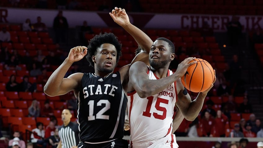 Duke Miles drives to the basket