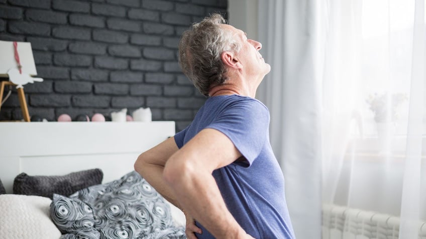 Older man back pain