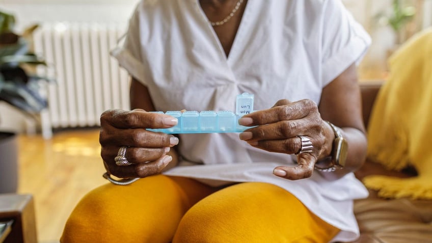 Woman with medications