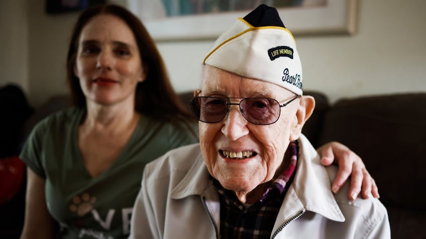 Warren Upton sits for a portrait with his daughter Barbara Upton at his home in San Jose, California, on Nov. 26, 2021.