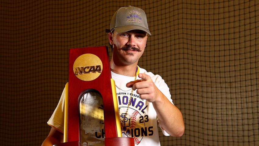 Paul Skenes with the trophy