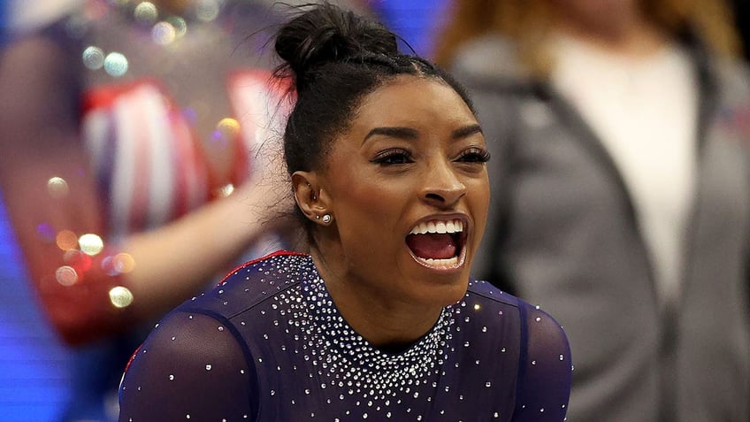 Simone Biles cheers