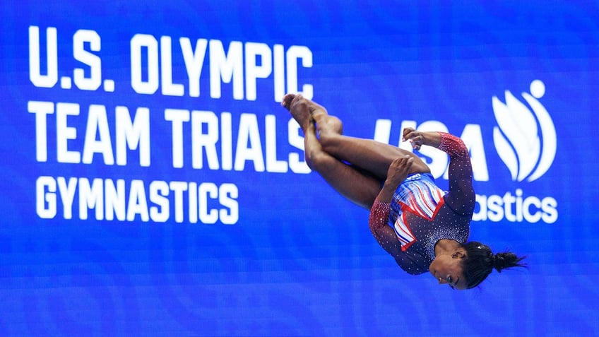 Simone Biles flips