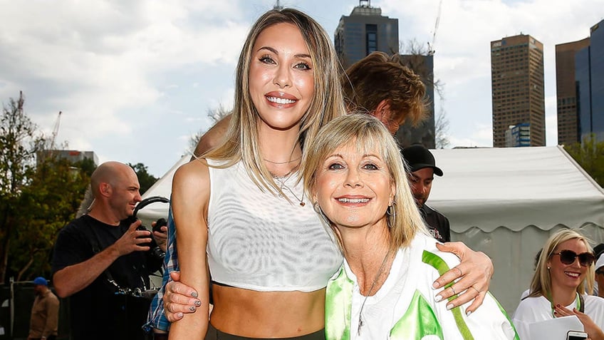 olivia newton johns daughter says mom continues to show up for her it doesnt just end with your body