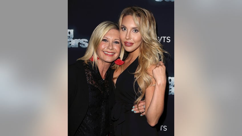 olivia newton johns daughter says mom continues to show up for her it doesnt just end with your body