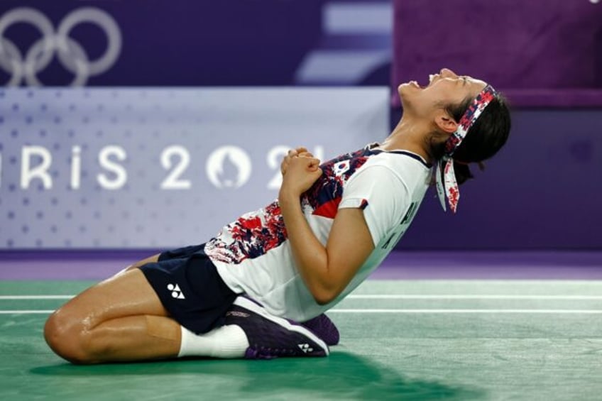 South Korea's An Se-young celebrates after winning the women's singles badminton gold