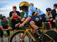 Olympic champion Evenepoel retains world title in ‘toughest time trial’