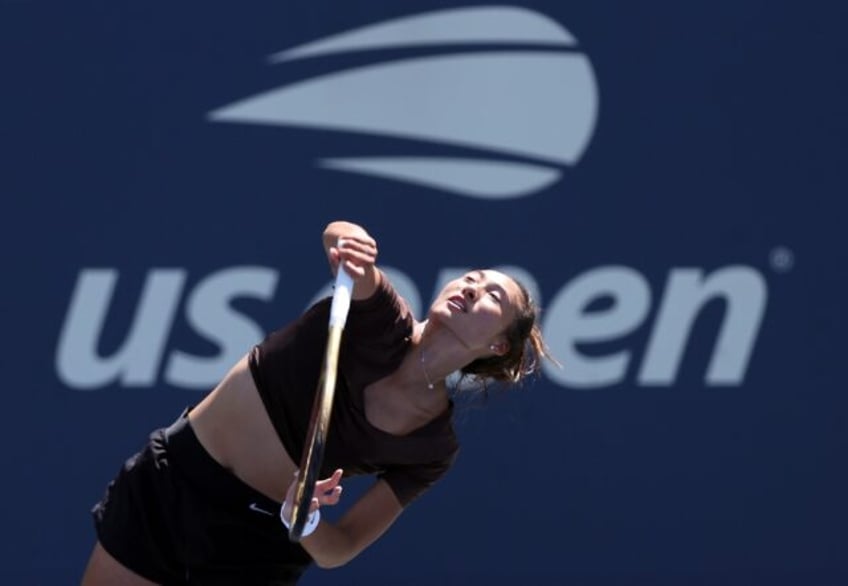 Olympic gold medallist Zheng Qinwen of China practices ahead of the US Open tennis champio