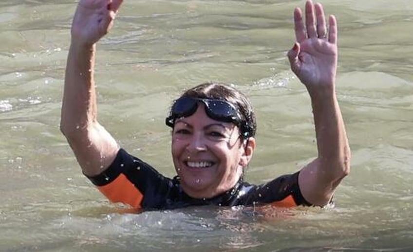 olympic event in seine river cancelled due to poor water quality days after mayor swam to prove its cleanliness