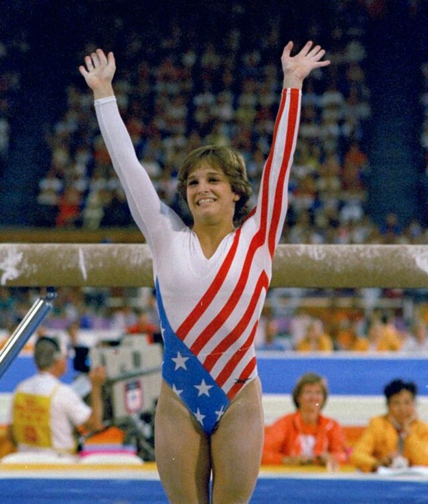 olympic gymnastics champion mary lou retton is in intensive care with pneumonia