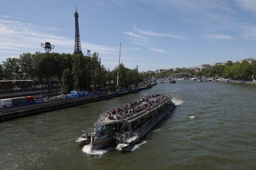 A tourist boat on the Seine river in Paris which is due to hold the swimming event in the