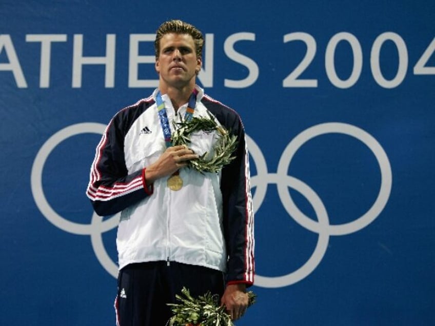 ATHENS - AUGUST 20: Gary Hall Jr. of the United States stands on the medal stand during t