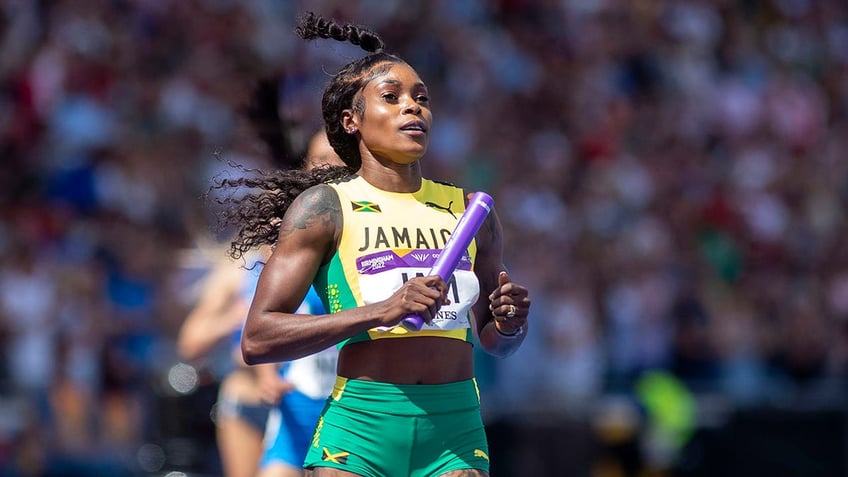 Elaine Thompson-Herah runs