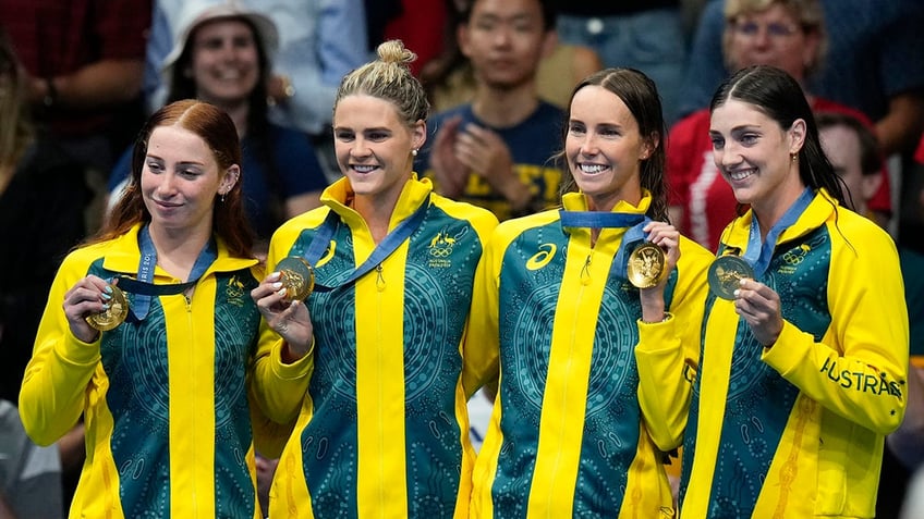 Australian swimmers with their gold medals