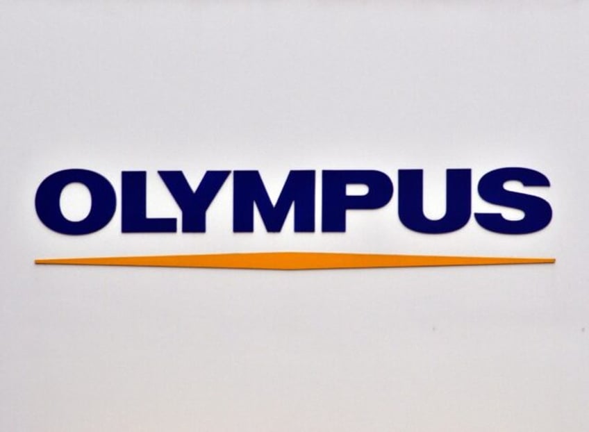 Olympus shares plunged six percent in morning trade