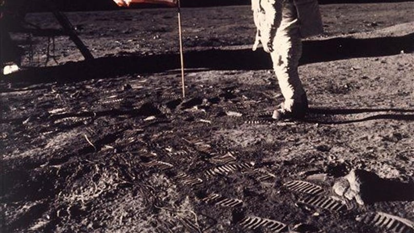 A July 20, 1969 photo from files made showing astronaut Edwin E. "Buzz" Aldrin Jr. posing for a photograph beside the lag deployed on the moon during the Apollo 11 mission.