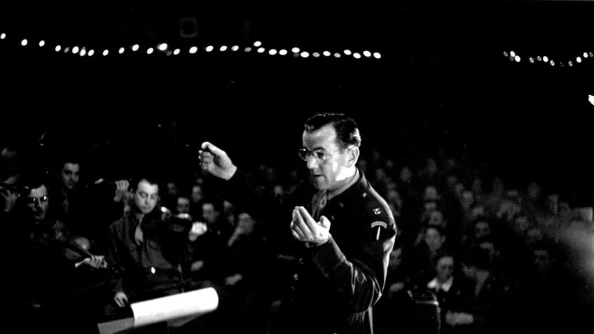 Glenn Miller conducting in uniform