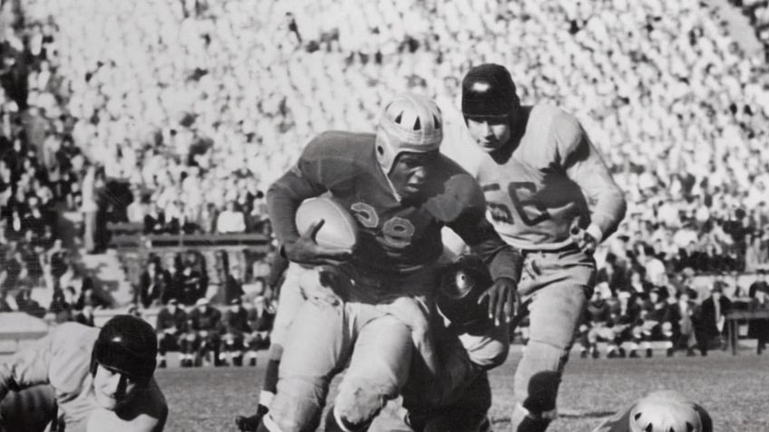 Jackie Robinson playing football