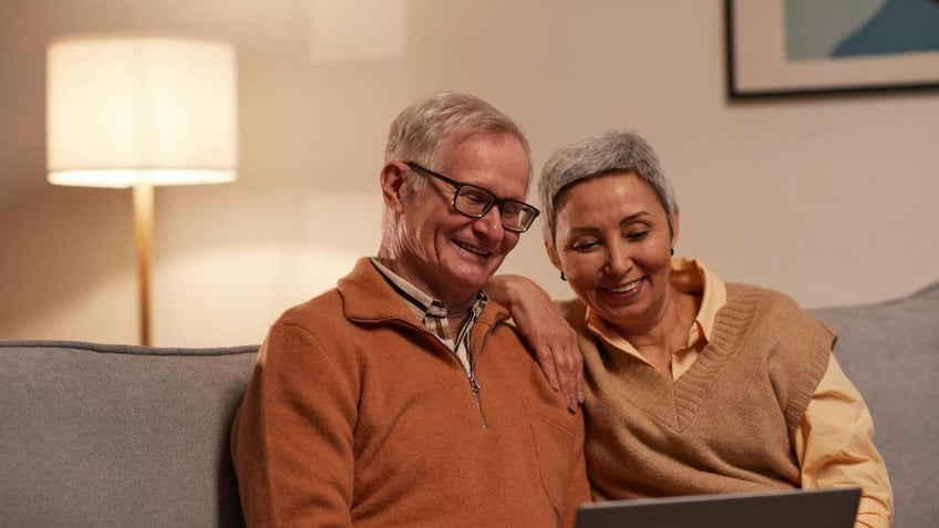 COUPLE on laptop