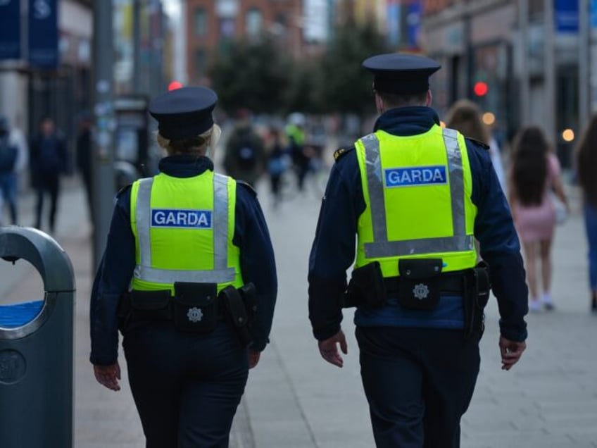 Members of An Garda Siochana (Irish Police) patrol Dublin's city center during the final d