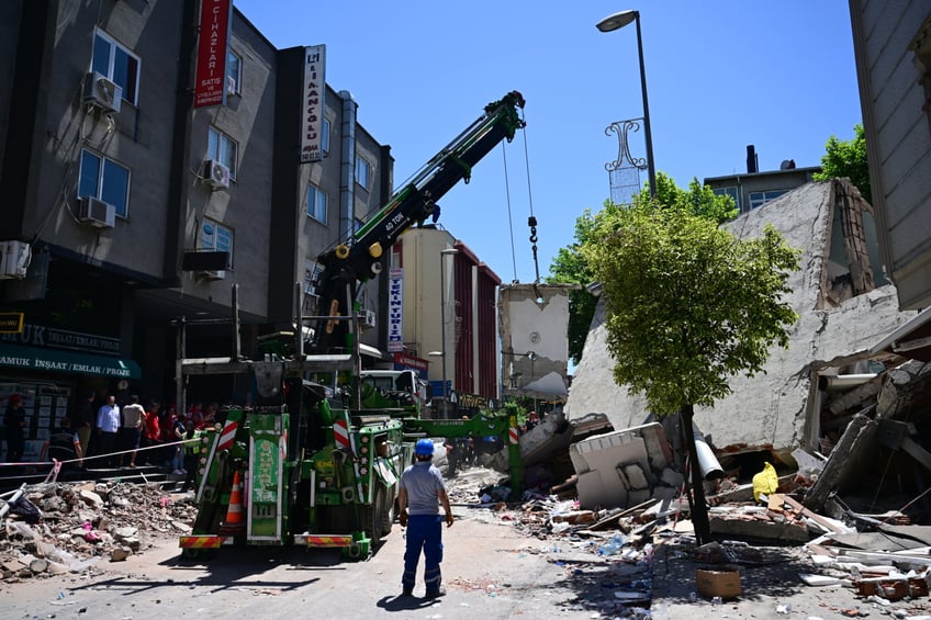 ISTANBUL, TURKIYE - JUNE 02: Firefighters and Turkish Disaster and Emergency Management Authority (AFAD) teams conduct search and rescue operations in the rubble of a building that collapsed for an undetermined reason in Kucukcekmece district of Istanbul, Turkiye on June 02, 2024. Many firefighters, health, police and Turkish Disaster and Emergency Management Authority (AFAD) teams were dispatched to the scene. 1 person died and 7 people were injured, 5 of them were transferred to the hospital, and 2 of them did not need treatment, as a result of the building collapse. (Photo by Oguz Yeter/Anadolu via Getty Images)