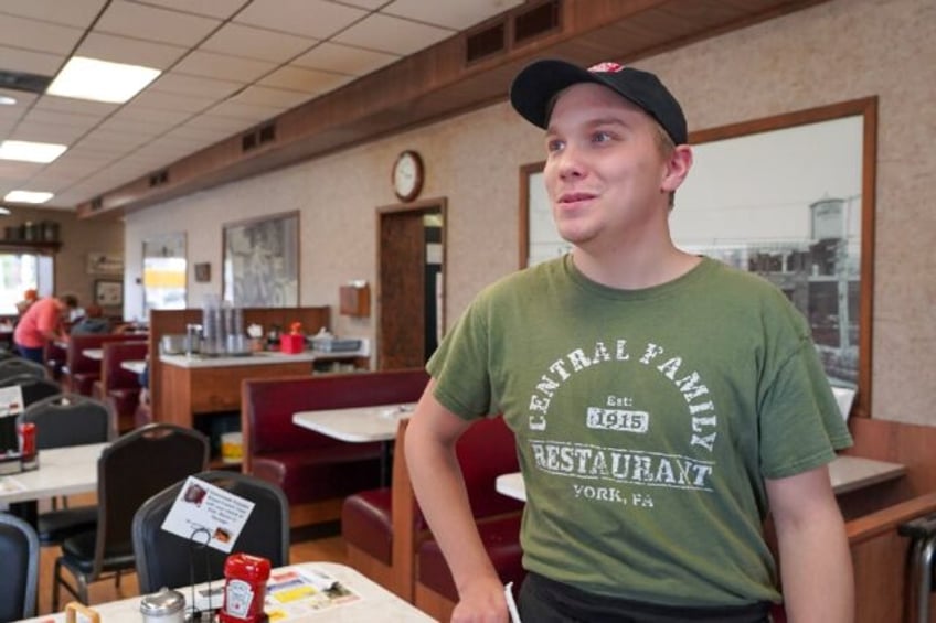 Zackree Kline, 21, works as a manager in a diner and also at a funeral home in York, Penns