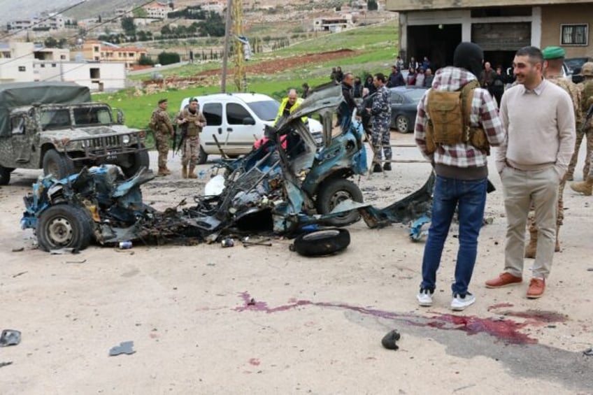 Lebanese soldiers cordon off the site of a strike in Suwairi, eastern Lebanon -- a securit