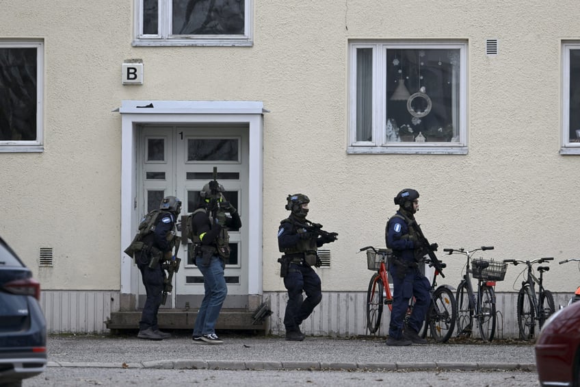 TOPSHOT - Finnish police investigate the scene at the primary school Viertola comprehensive school where a child opened fire and injured three other children, on April 2, 2024 in Vantaa, outside the Finnish capital Helsinki. Police said, that the attacker was in custody, and "All those involved in the shooting incident are minors". (Photo by Markku Ulander / Lehtikuva / AFP) / Finland OUT (Photo by MARKKU ULANDER/Lehtikuva/AFP via Getty Images)