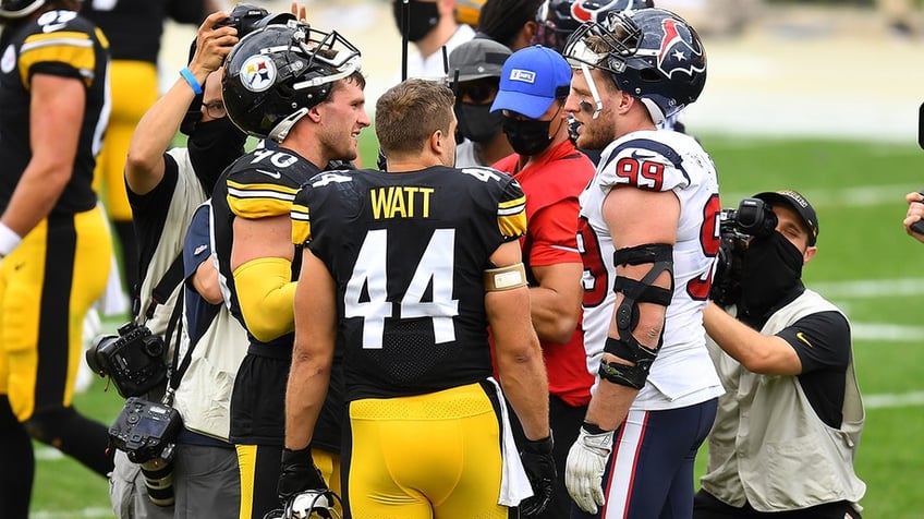 Watt brothers on the football field