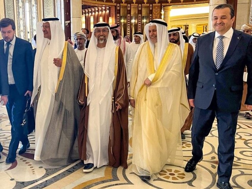 Russia's Energy Minister Alexander Novak (L) and his counterparts from Saudi Arabia P