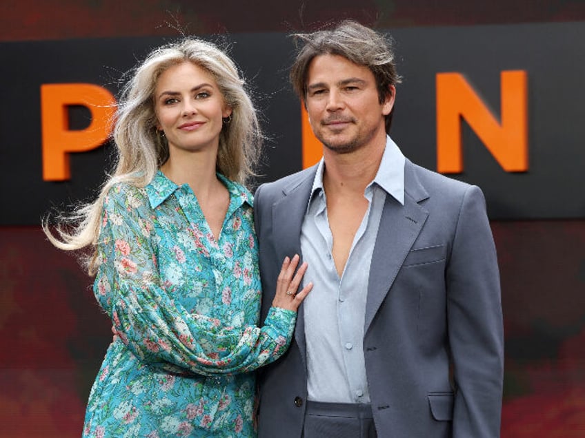 US actor Josh Hartnett (R) and his wife Tamsin Egerton (L) pose on the red carpet upon arr